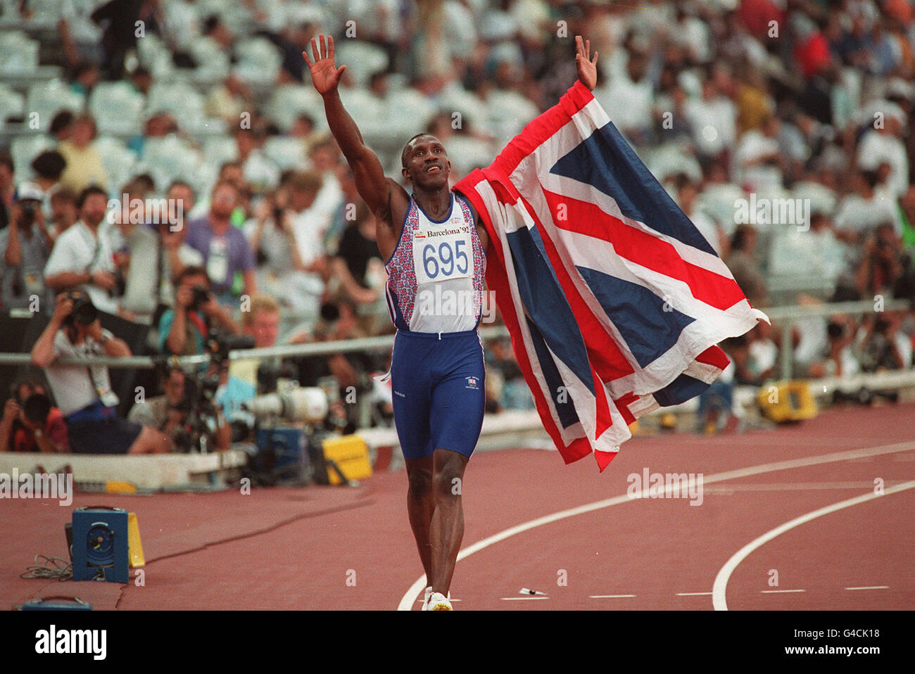 Linford Christie celebrates his victory in the Olympic 100m race final in Barcelona. * It has been confirmed that Christie failed a drugs test at an indoor meeting in Dortmund 13/2/99. Stock Photo