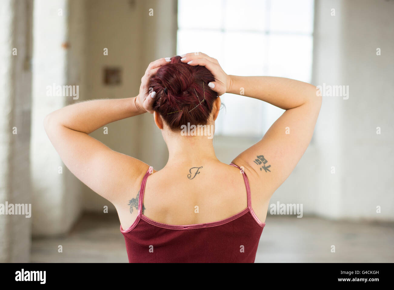 Distressed woman head in hands Stock Photo