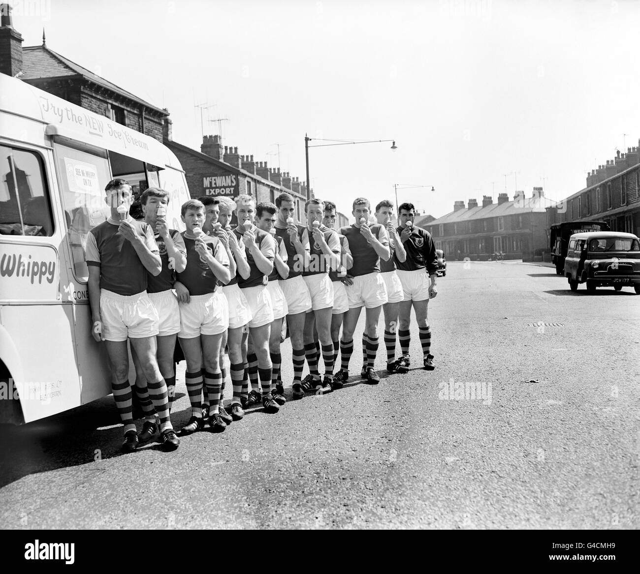 A welcome break from training for the Burnley players during the warm sunshine and a good trade for the ice cream vendor, who stopped outside the ground. Stock Photo
