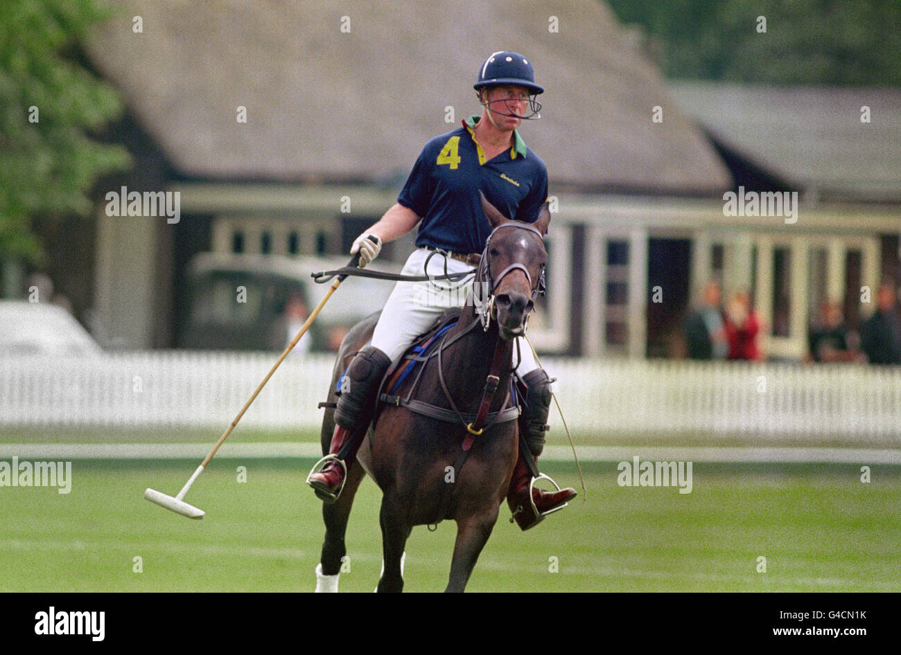 The Prince of Wales playing for 'Lovelocks' who lost to 'Cirencester Park' in the Dorchester Trophy 1998 at Cirencester Park Polo Club. Stock Photo