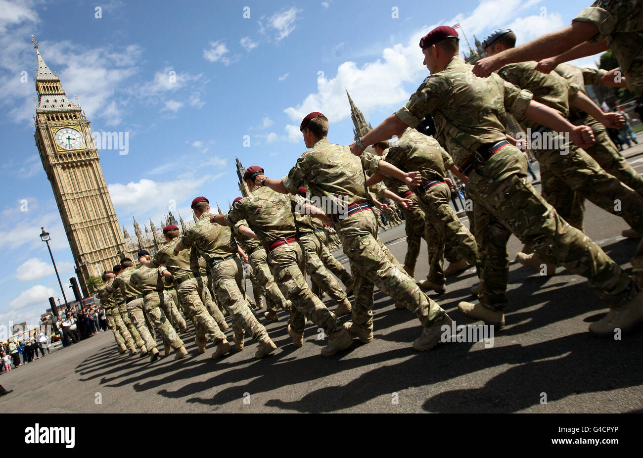 Soldiers from 16 Air Assault Brigade march from Wellington Barracks to the Houses of Parliament, in Westminster, central London, during a homecoming parade, before attending a reception held by the All Party Parliamentary Group for the Armed Forces . Stock Photo