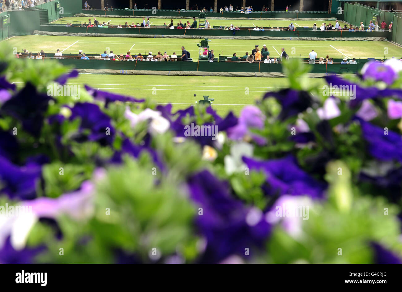 A general view of the outside courts on the morning of day five of the 2011 Wimbledon Championships at the All England Lawn Tennis and Croquet Club, Wimbledon. Stock Photo
