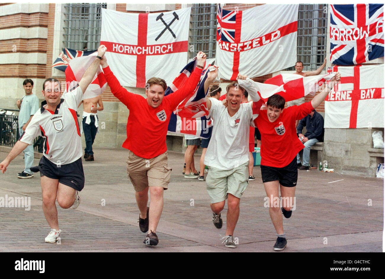 England football fans (from left) John Marshell, Phill Macartney, Len Sills and Ed Fletcher, from Balham, south London in the centre of Toulouse this afternoon (Monday) ahead England's World Cup clash with Romania in the city of tonight. Photo by Peter J Jordan/PA. See PA story WORLD CUP England Stock Photo