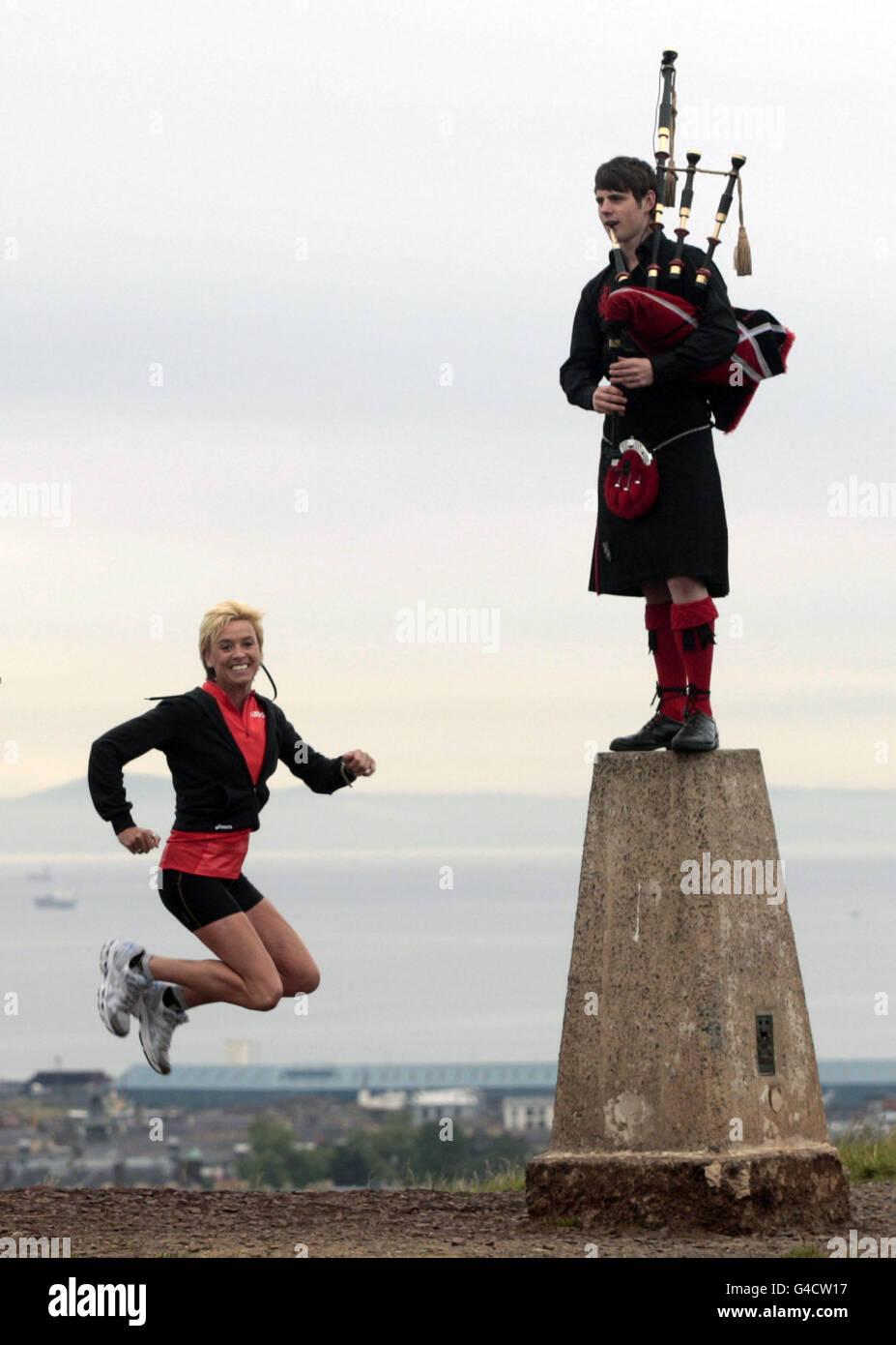 Liz McColgan with Dougie McCane from the Red Hot Chilli Pipers launch the Rock 'n' Roll Marathon from Edinburgh's Calton Hill. Stock Photo