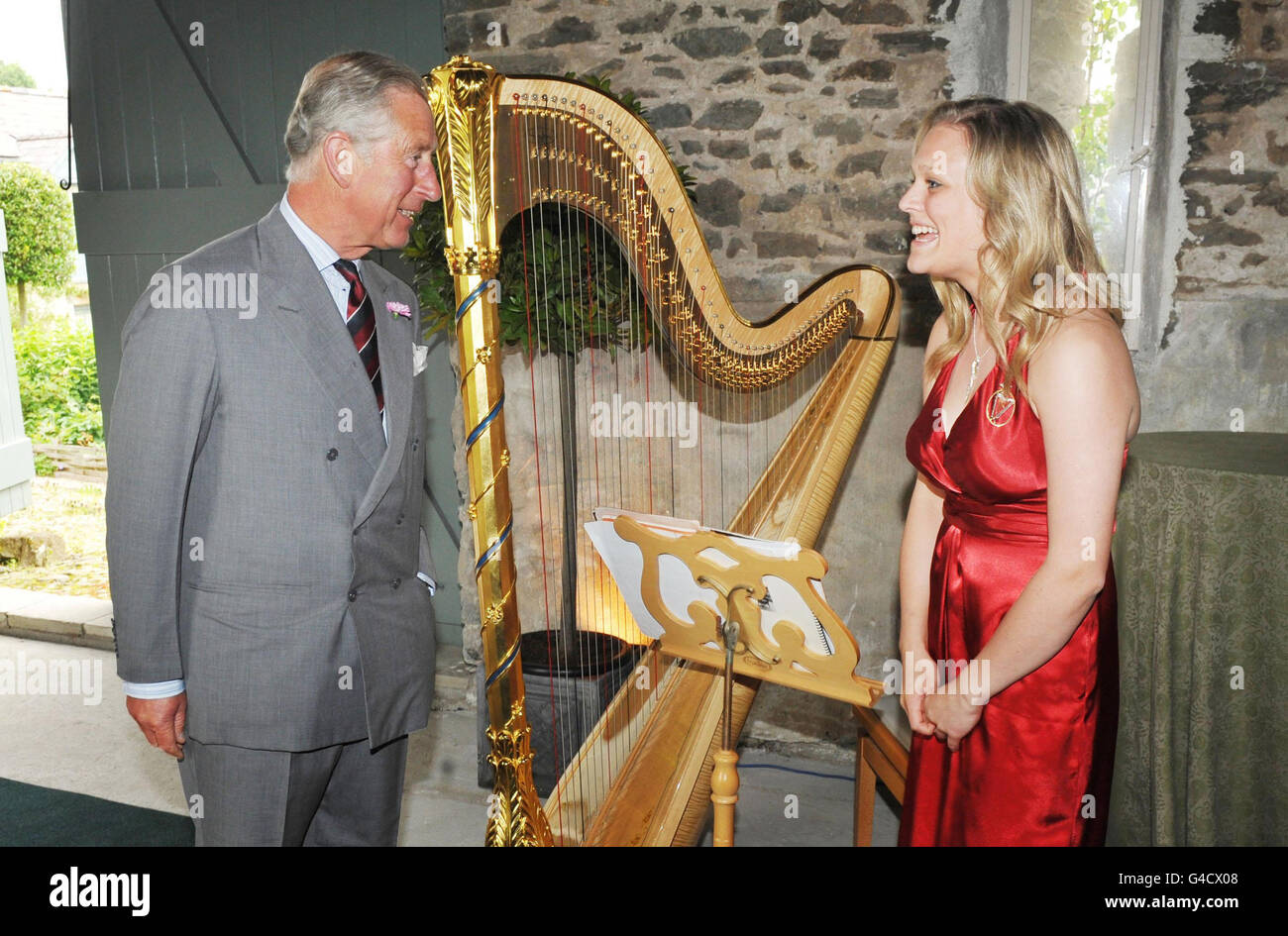 The Prince of Wales speaks with his new official harpist Hannah Stone