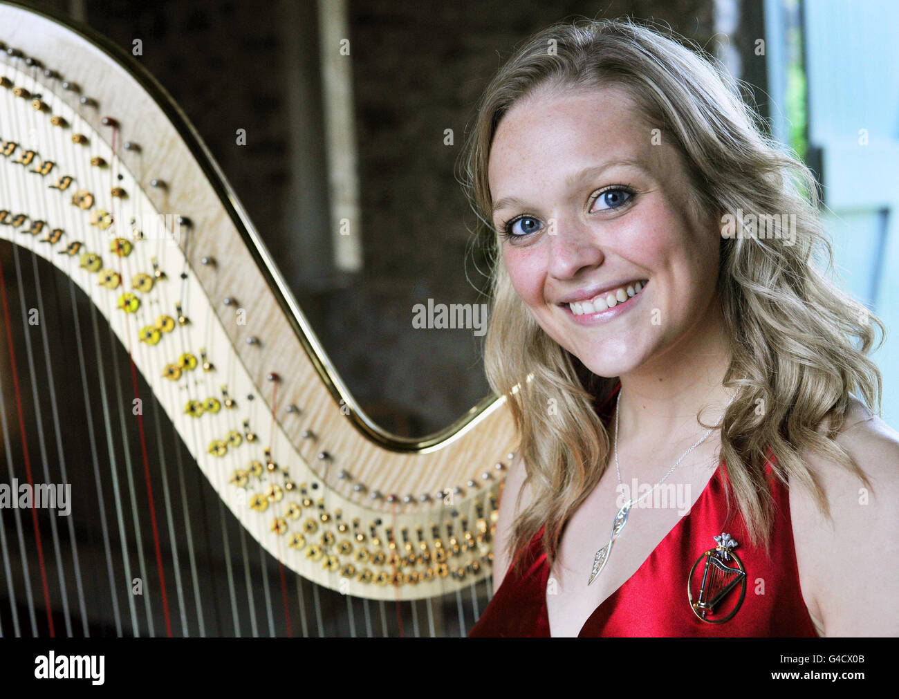 The new official harpist to the Prince of Wales, Hannah Stone, pictured during a reception for