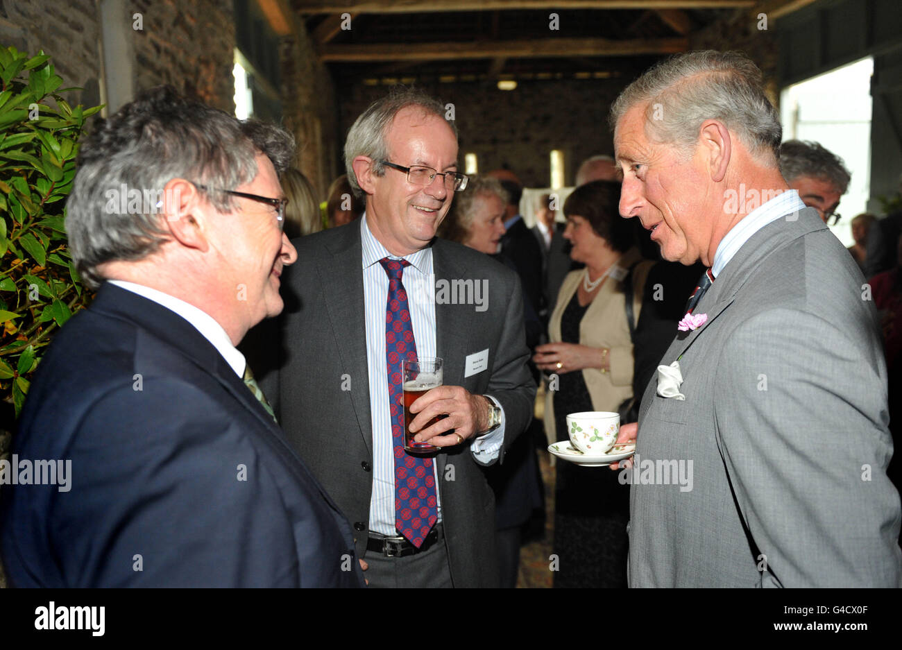 The Prince of Wales talks to guests during a reception for the Cambrian