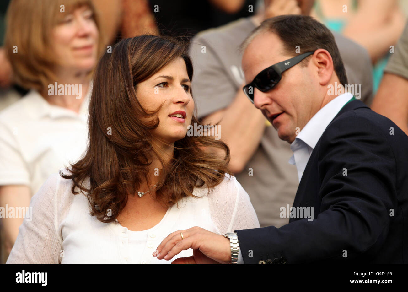 Mirka Vavrinec, wife of Switzerland's Roger Federer watches his match against Russia's Mikhail Youzhny on day seven of the 2011 Wimbledon Championships at the All England Lawn Tennis and Croquet Club, Wimbledon. Stock Photo