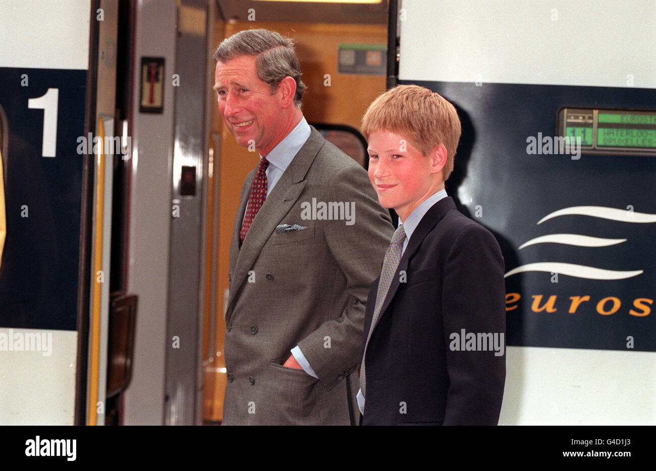 PA NEWS PHOTO 26/6/98 THE PRINCE OF WALES AND SON PRINCE HARRY AT LONDON'S WATERLOO INTERNATIONAL STATION WHERE THEY DEPARTED FOR LENS TO WATCH THE FINAL GROUP G CLASH BETWEEN ENGLAND AND COLOMBIA Stock Photo