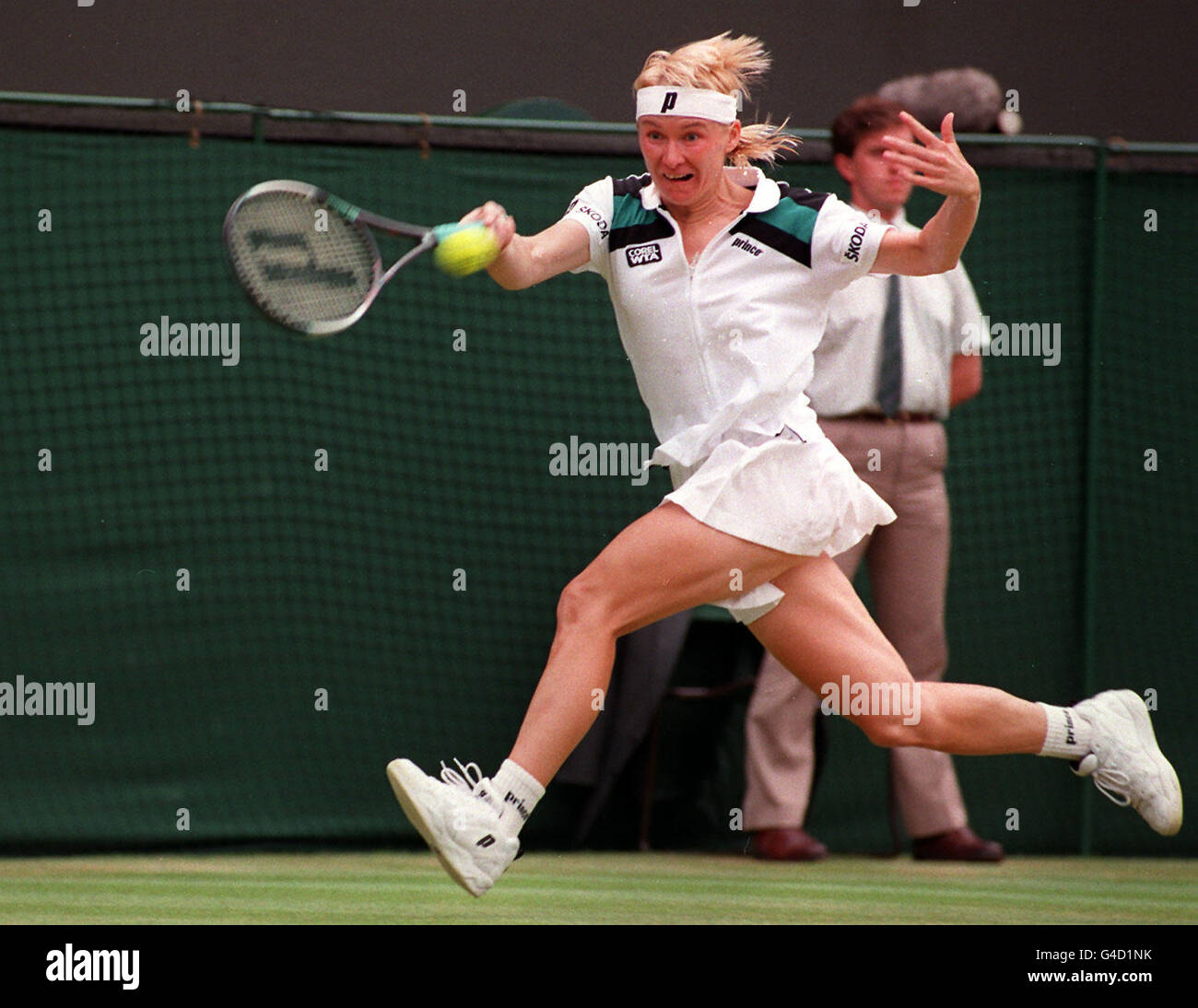 Jana Novotna in action during her game against Irina Spirlea to go into the quarter finals at Wimbledon after winning the match 6-2,6-3.( Photo Fiona Hanson/PA) Stock Photo