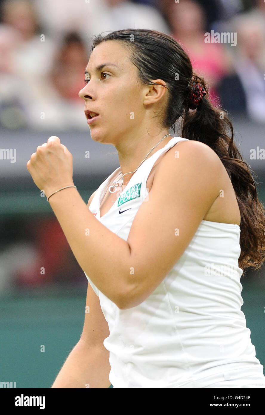 France's Marion Bartoli celebrates against Germany's Sabine Lisicki during day eight of the 2011 Wimbledon Championships at the All England Lawn Tennis and Croquet Club, Wimbledon. Stock Photo