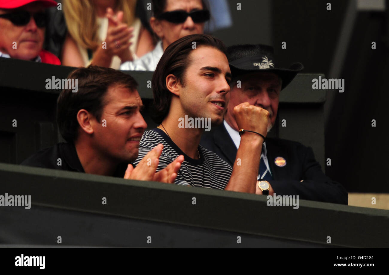 Maria Sharapova's fiance Sasha Vujacic celebrates as he watches her match against Germany's Sabine Lisicki on day ten of the 2011 Wimbledon Championships at the All England Lawn Tennis and Croquet Club, Wimbledon. Stock Photo