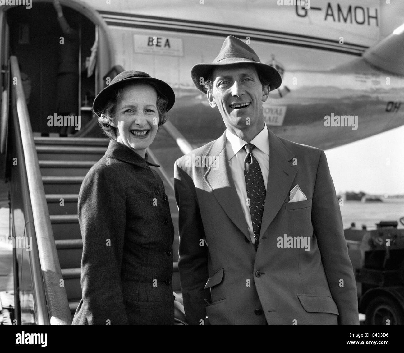 Actor Peter Cushing and his wife Helen at London's Heathrow Airport on their return by BEA liner from Madrid. Stock Photo