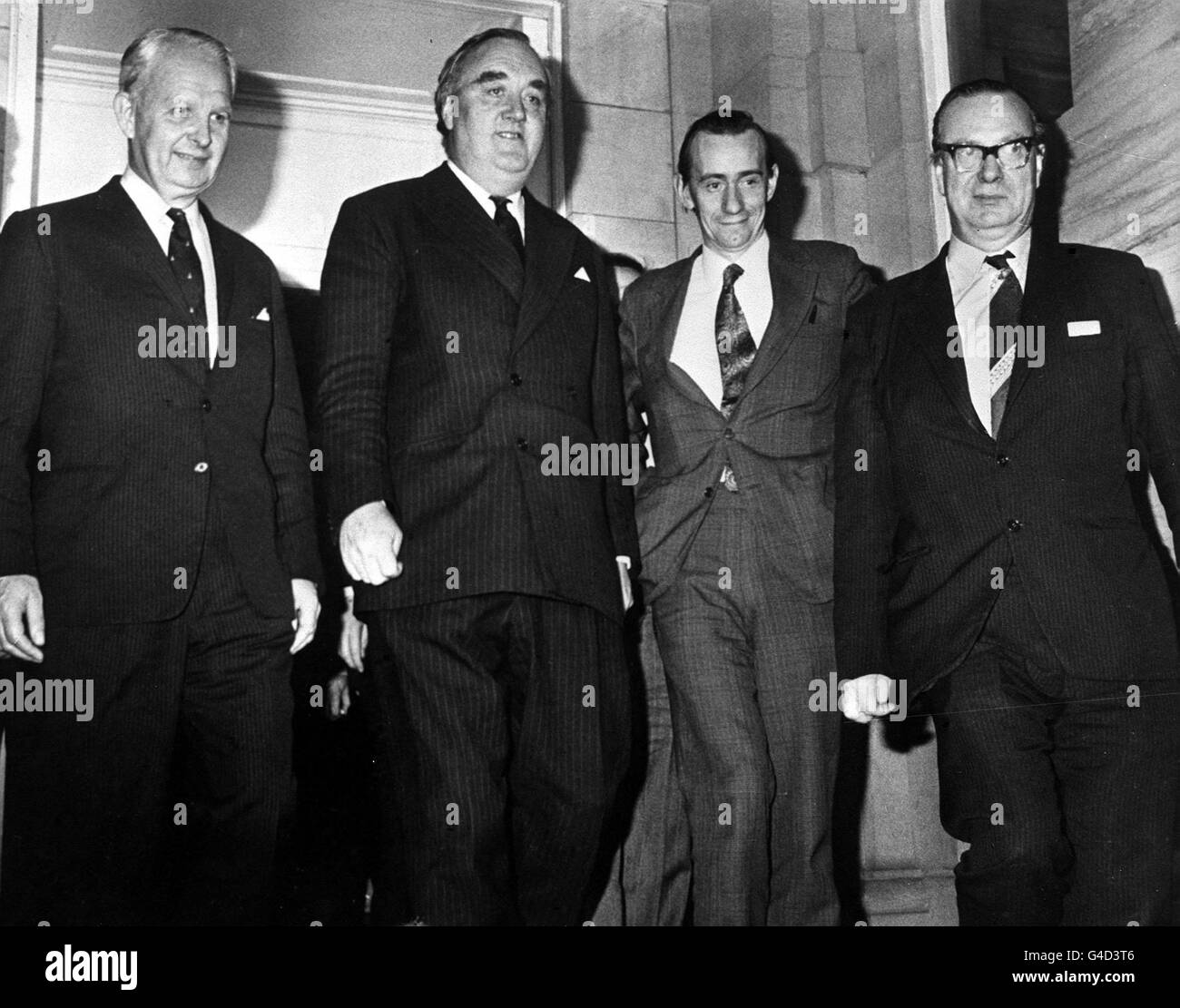 File picture, dated November 22, 1973, left to right, Mr Brian Faulkner, leader of the Unionist Party, Willie Whitelaw, Secretary of State for Northern Ireland, Mr Oliver Napier of the Alliance Party and Mr Gerard Fitt, Social Democratic Party, leaving Stormont Castle. Stock Photo