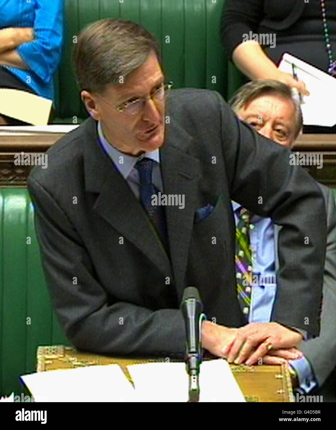 Attorney General Dominic Grieve QC speaks in the House of Commons, London, where a debate is taking place on the recent phone hacking allegations. Stock Photo