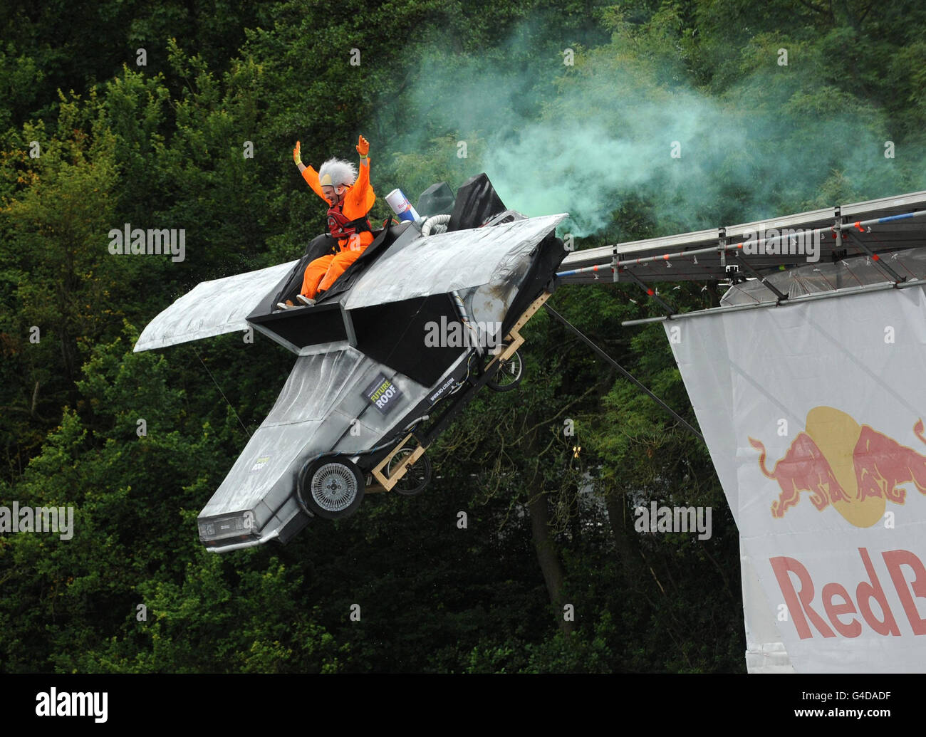 Doc Brown's Delorian takes off during the Red Bull Flugtag event in Roundhay Park, Leeds. Stock Photo