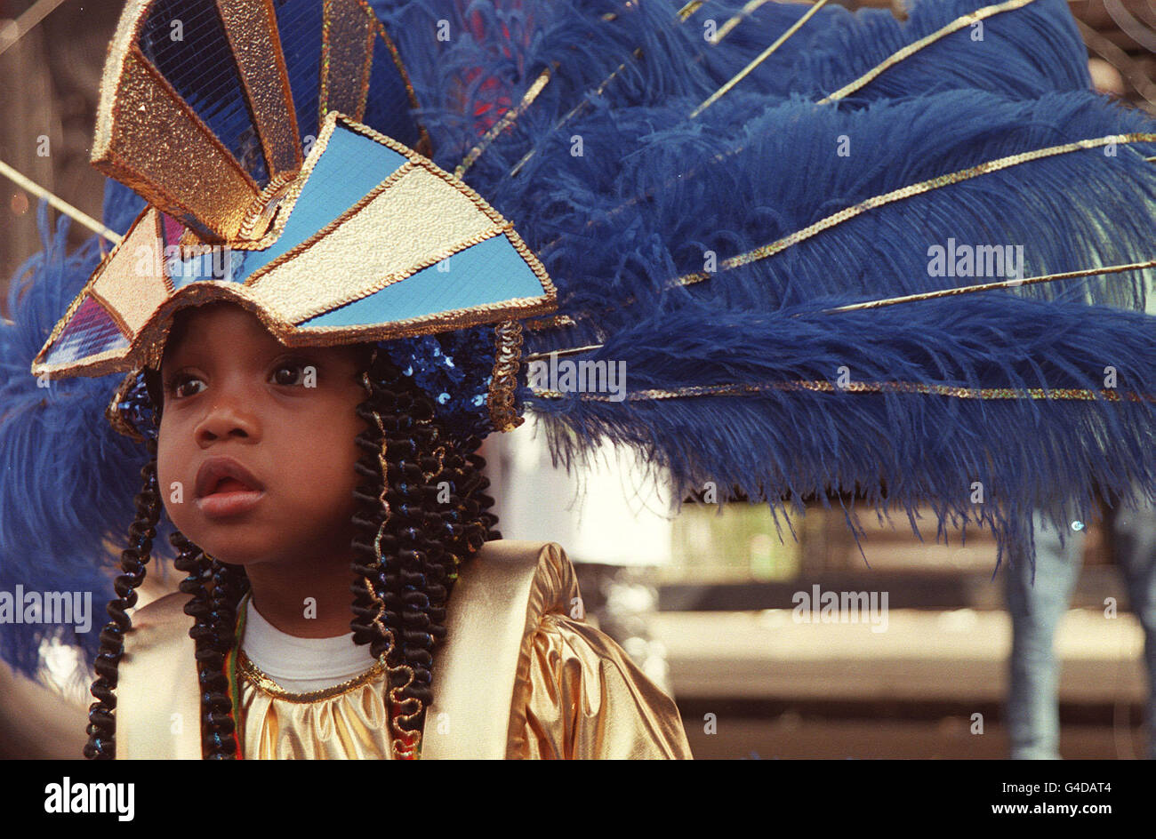 PA NEWS PHOTO 31/8/98 A CHILD DRESS IN AN ELABORATE COSTUME AT THE 1998 NOTTING HILL CARNIVAL. Stock Photo