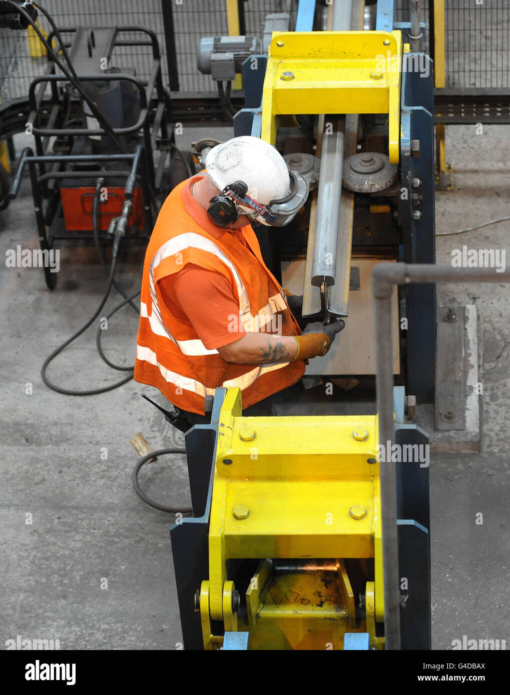 Tata Steelworks - Scunthorpe. A general view of a worker in the rail track production section at the Tata Steelworks, Scunthorpe. Stock Photo