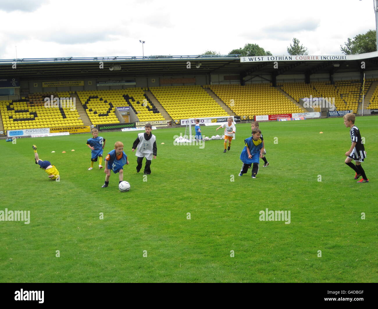 Children playing football as they attended a football training summer