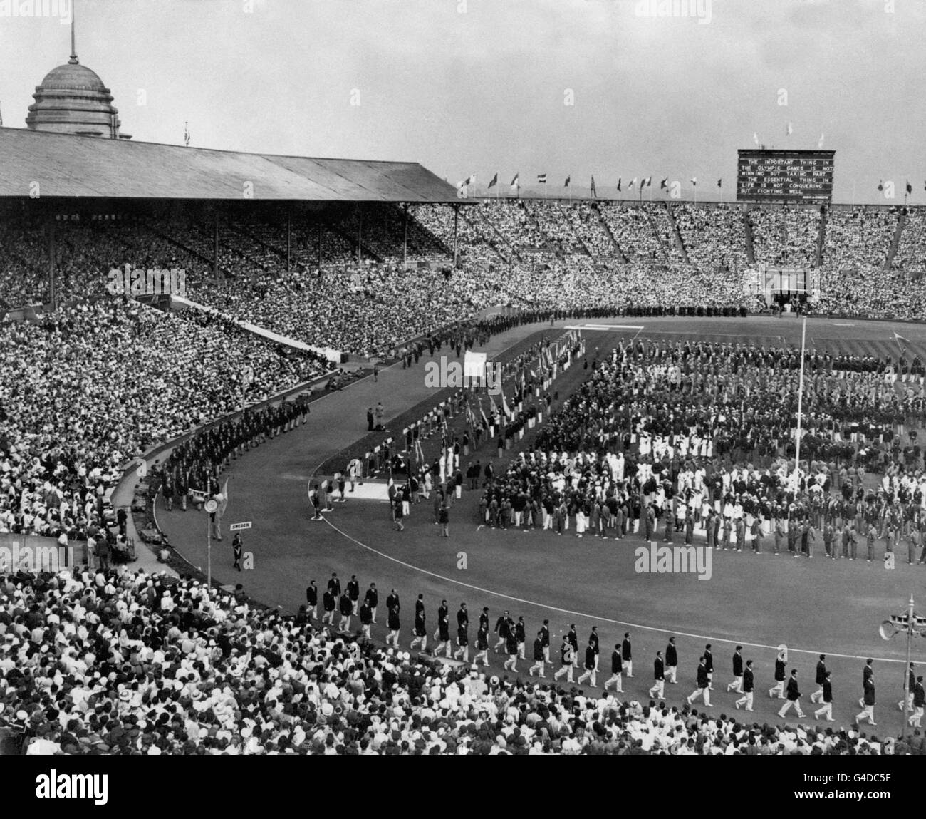 A general view of the Wembley Arena, London, with members of the Swedish  Olympic team marching past, before the official opening of the Games by H.M.  the King 16/1/04: The blueprint of