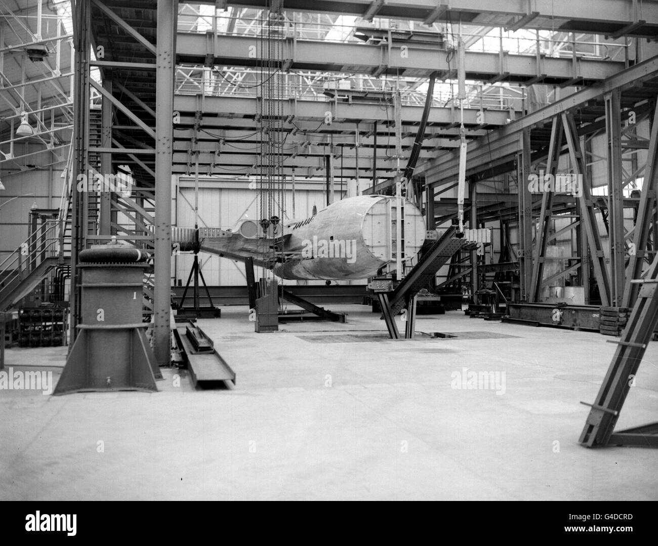 PA NEWS PHOTO 21/7/53  FUSELAGE OF A CRESCENT-WING VICTOR JET BOMBER IS TESTED IN THE NEW STRUCTURAL TEST FRAME  AT RADLETT, HERTFORDSHIRE Stock Photo