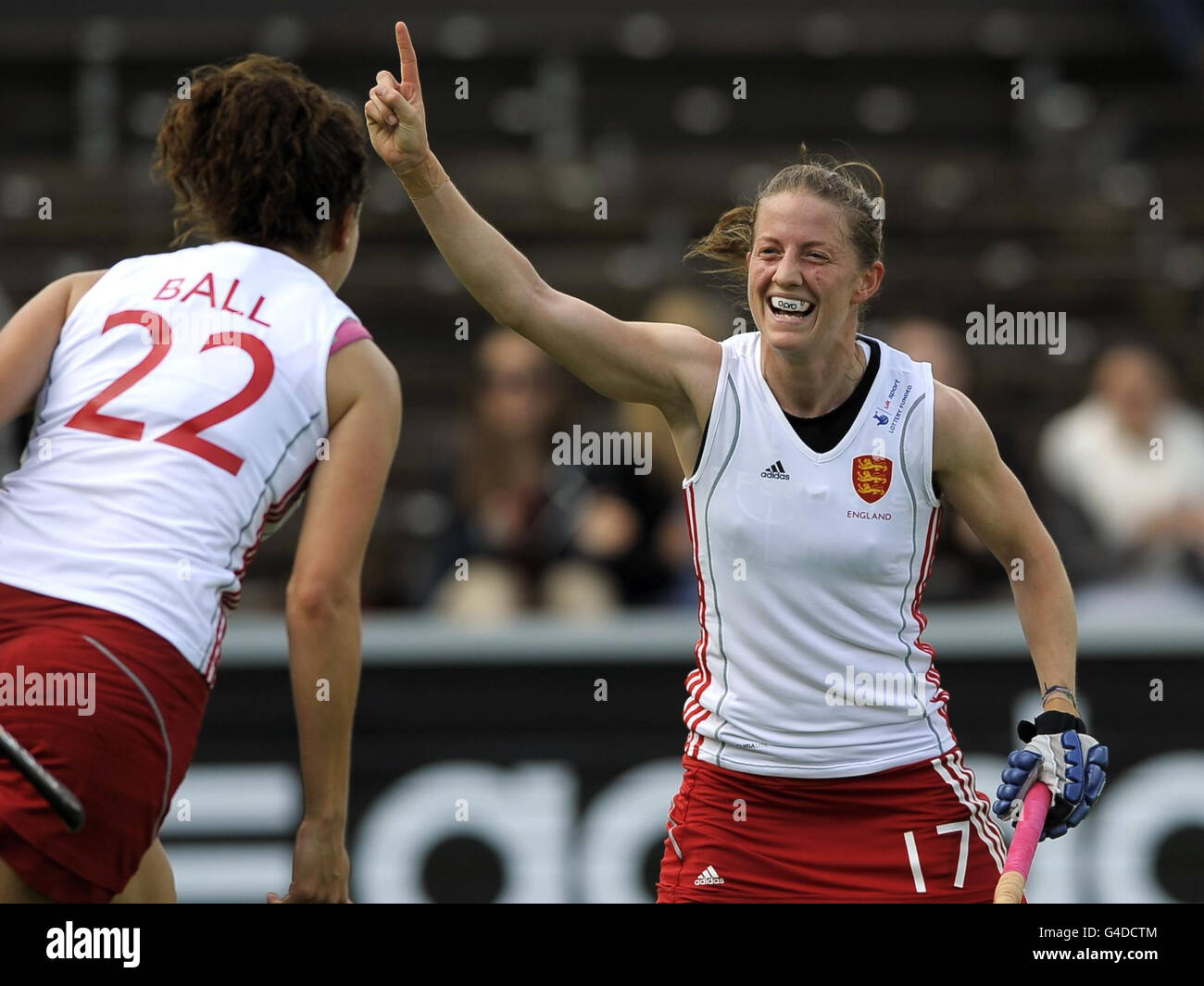England's Beckie Herbert (centre) celebrates the opening goal against South Korea during the Group A match of Rabo FIH Women's Champions Trophy at the Wagener Stadium, Amsterdam, Netherlands. Stock Photo