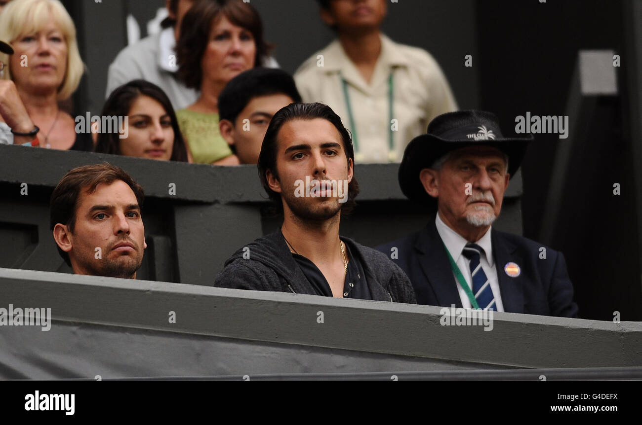 Maria Sharapova's fiance Sasha Vujacic watches as she plays Slovakia's Dominika Cibulkova on Centre Court during day eight of the 2011 Wimbledon Championships at the All England Lawn Tennis and Croquet Club, Wimbledon. Stock Photo