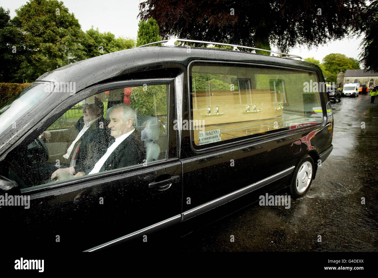 A hearse leaves Urbleshanny graveyard in Scotstown, Co.Monaghan, where ...