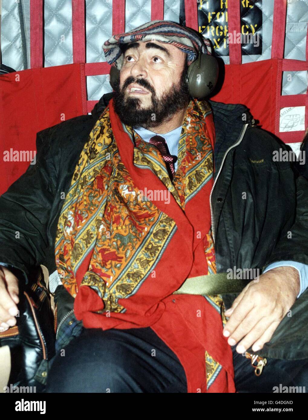 PA NEWS 21/12/97 ITALIAN TENOR LUCIANO PAVAROTTI, PICTURED DURING A CHINOOK HELICOPTER FLIGHT TO SOUTH BOSNIA WHERE HE OPENED A MUSIC CENTRE IN MOSTAR. THE CENTRE WILL PROVIDE MUSIC THERAPY FOR THE YOUNG SURVIVORS OF THE BOSNIAN WAR. Stock Photo