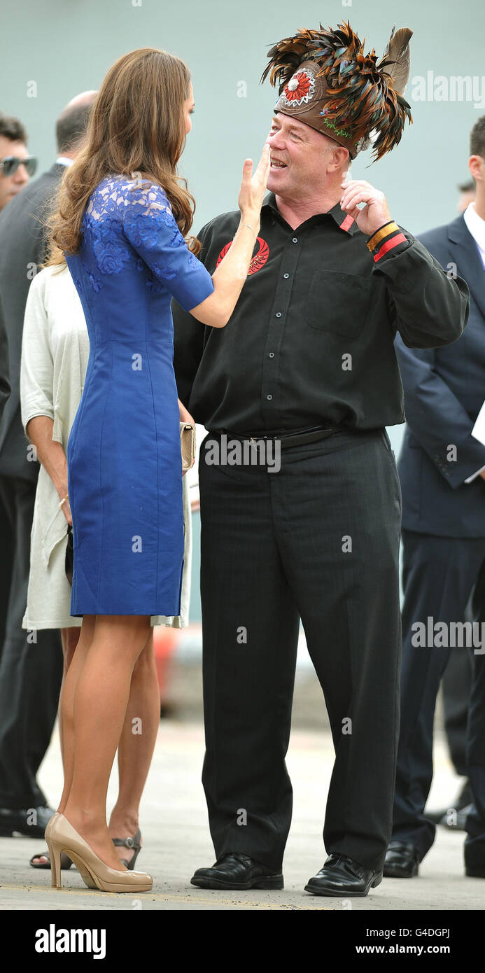 The Duchess of Cambridge talks to Grand Chief of the Huron-Wendat Indians, Konrad Sioui, as they leave HMCS Montreal at Quebec City, after travelling down river from Montreal in Canada overnight. Stock Photo
