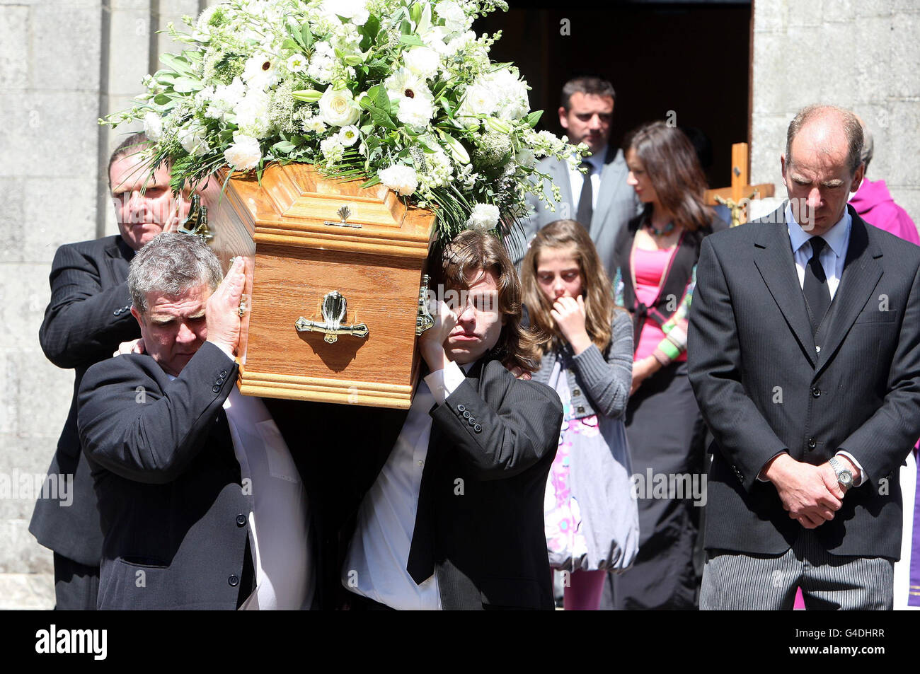Family members carry coffin after hires stock photography and images