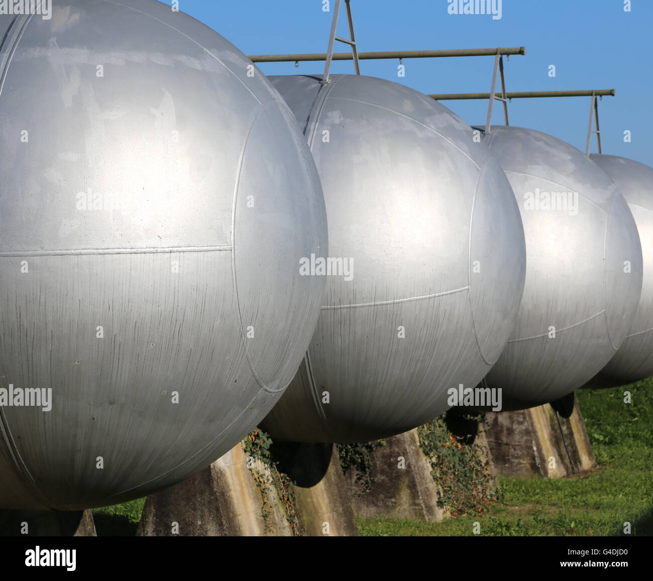 many giant gas pressure vessels for the storage of flammable natural