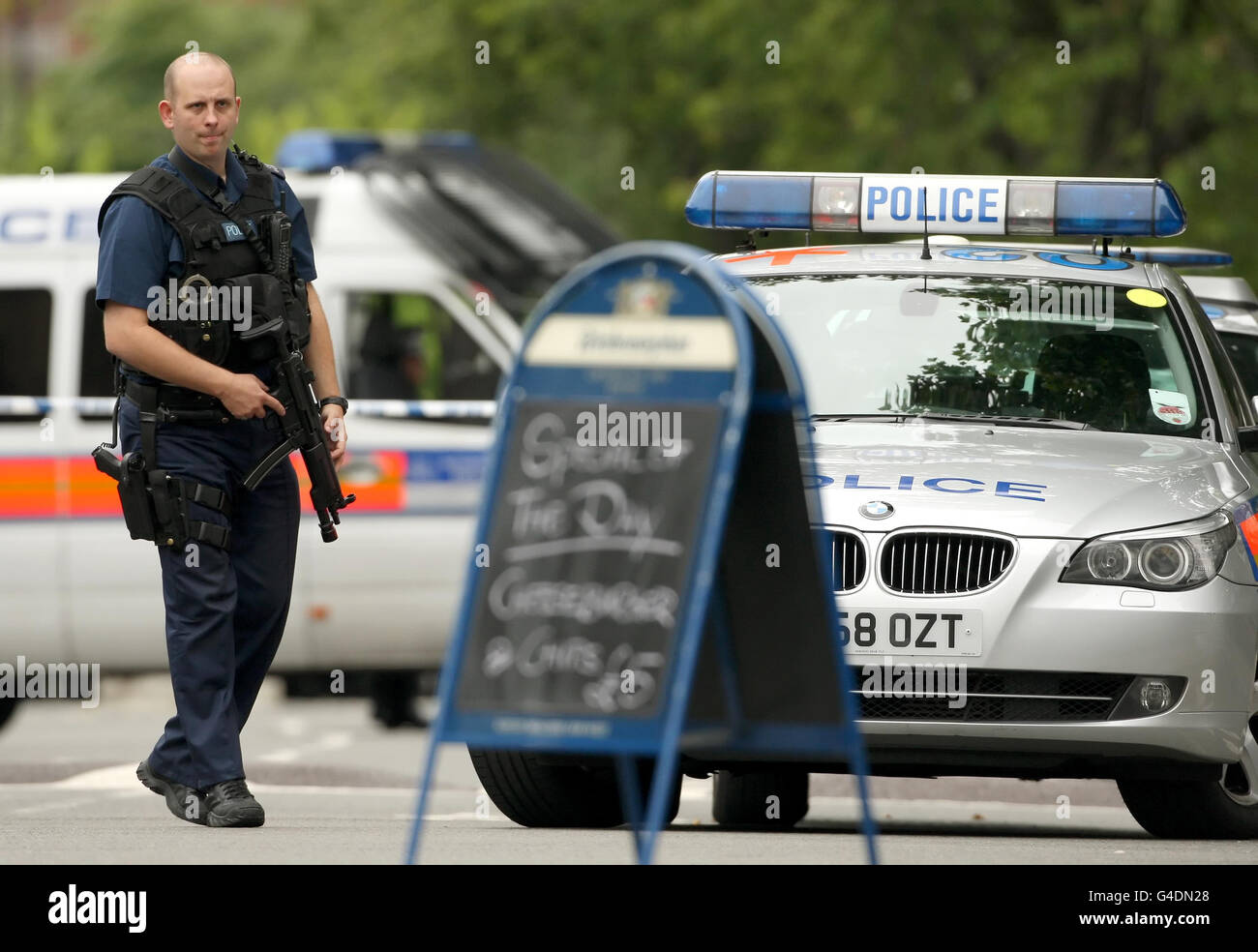 Man shot in Kennington. Armed police at the scene of a shooting on Black Prince Lane in Kennington, south London. Stock Photo