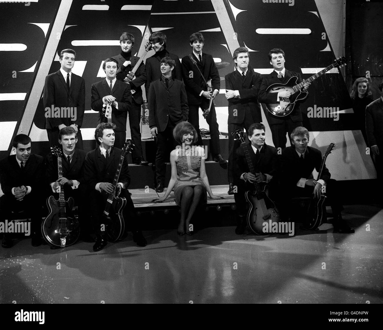 Rehearsals at Alpha studios, Birmingham, for ABC's 'Thank Your Lucky Stars' programme with Brian Matthew, Cilla Black (centre), The Beatles (back), Billy J. Kramer and the Dakotas, Gerry and the Pacemakers and The Searchers. Stock Photo
