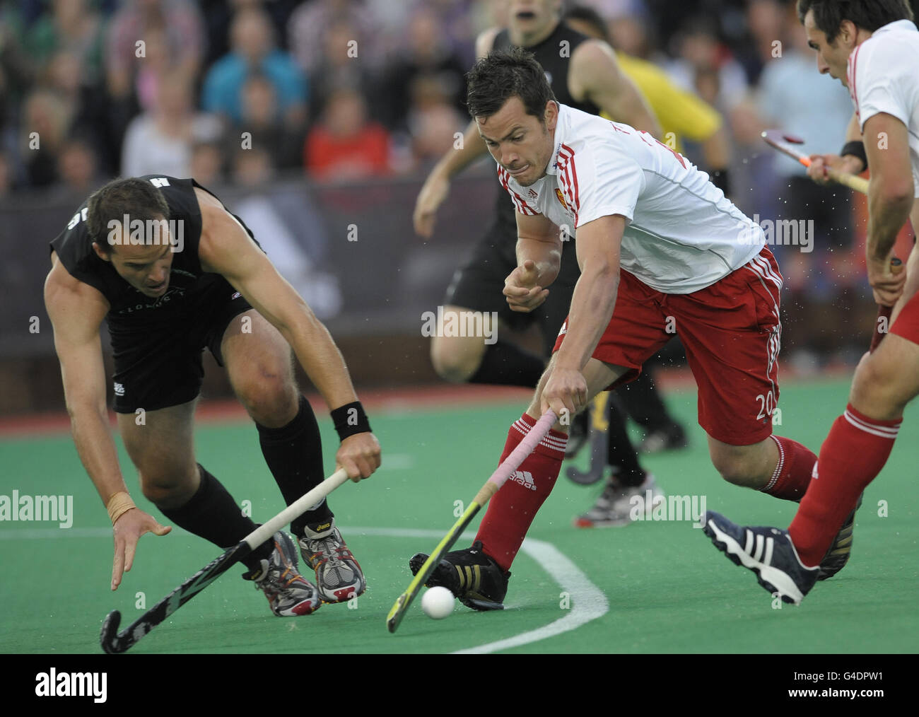 England's James Tindall challenges with New Zealand's Blair Hopping