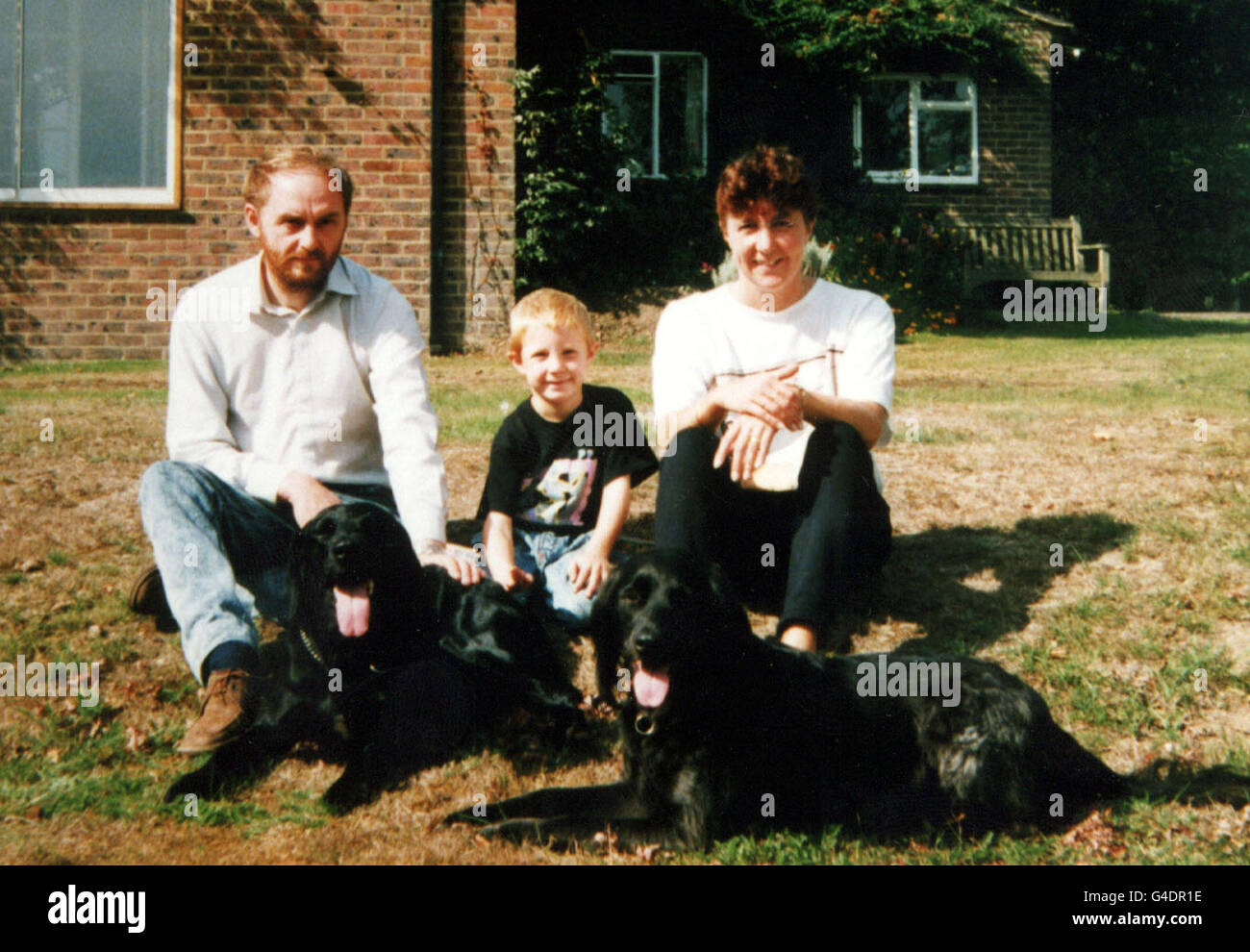 Carol and John Marshall, with their son Thomas, taken at a friends home in 1991. On Monday (17 August) Mr and Mrs Marshall, made a desperate plea for the person harbouring their son's killer to contact the police. The body of 12-year-old Thomas was found dumped in a wooded picnic area 50 miles from his home in Happisburgh, Norfolk, on August 22nd last year - he had been strangled. PA Photos. See PA story POLICE Marshall Stock Photo