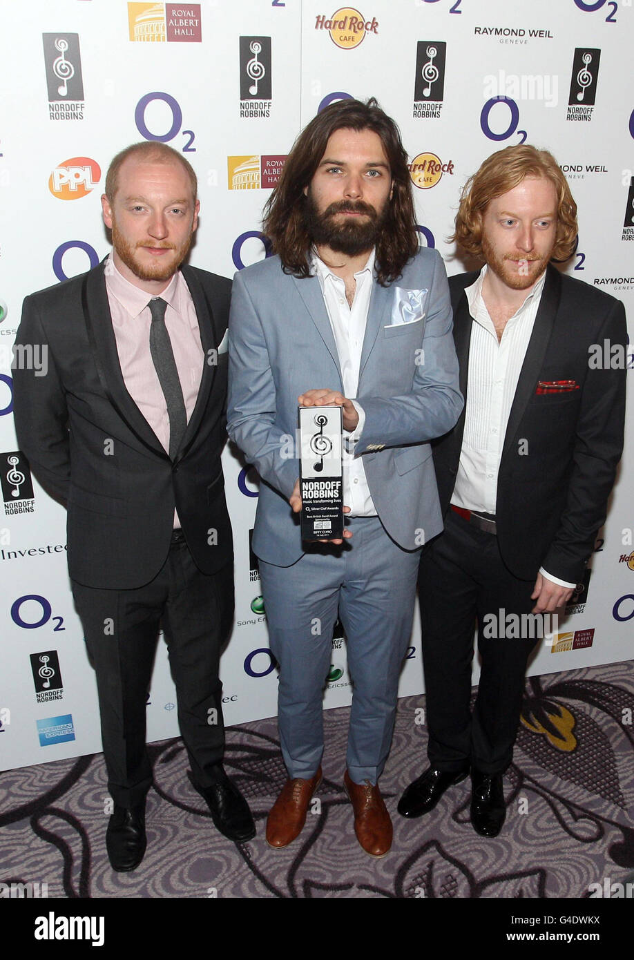 From the left) Ben Johnston, Simon Neil and James Johnston of Biffy Clyro  with their Best British Band award at the Nordoff Robbins O2 Silver Clef  Awards in the Hilton, London Stock