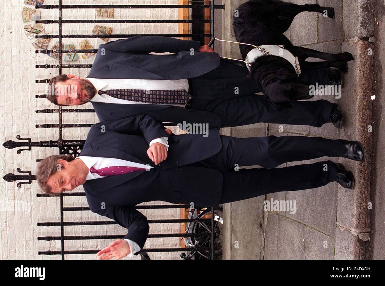 British Prime Minister Tony Blair (left) and Education and Employment Secretary David Blunkett (right) arrive at Hawley Infants School, Buck St. Camden to make a brief statement about yesterday's announcement of new money for education. See PA Story POLITICS Spending. Photo by Peter Jordan/PA. Stock Photo