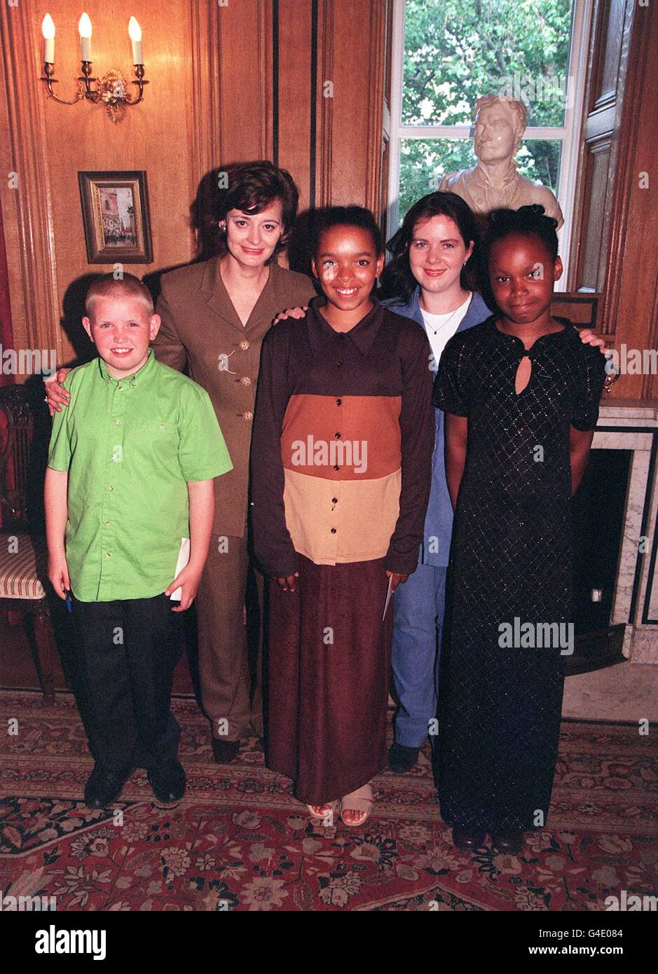 Prime Minsister's wife Cherie Blair with MP Claire Ward and children (from left) Billy Grace, Tiffany Andrews and Aiseosa Okuonghae during their visit to 10 Downing Street this evening (Thursday) to have tea with Mrs Blair. Photo by John Stillwell/PA. Stock Photo