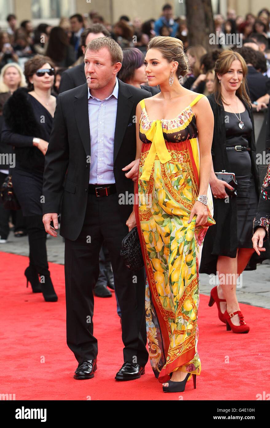 Guy Ritchie and girlfriend Jacqui Ainsley arriving for the world premiere of Harry Potter And The Deathly Hallows: Part 2. Stock Photo