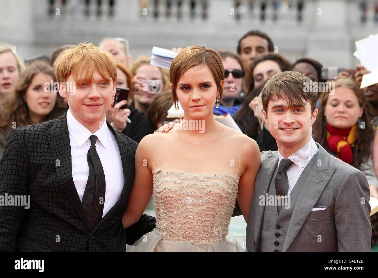 Rupert Grint, Emma Watson and Daniel Radcliffe at the world premiere of Harry Potter And The Deathly Hallows: Part 2. Stock Photo