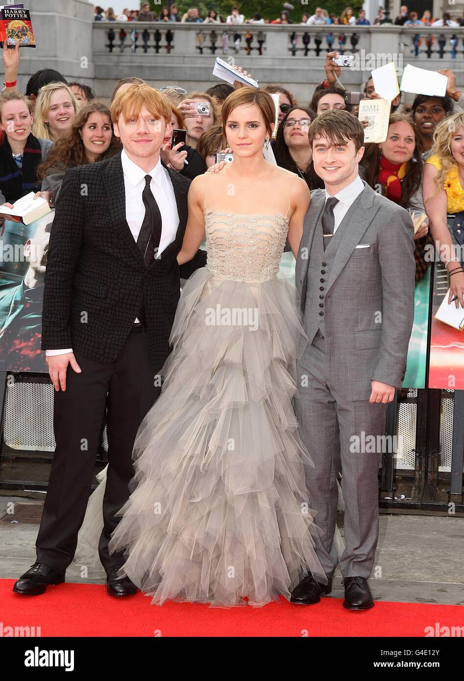 Rupert Grint, Emma Watson and Daniel Radcliffe at the world premiere of Harry Potter And The Deathly Hallows: Part 2. Stock Photo