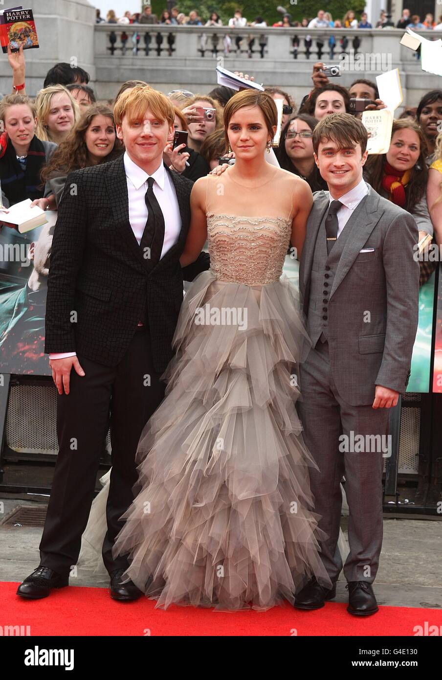 Rupert Grint, Emma Watson and Daniel Radcliffe at the world premiere of Harry Potter And The Deathly Hallows: Part 2. Stock Photo