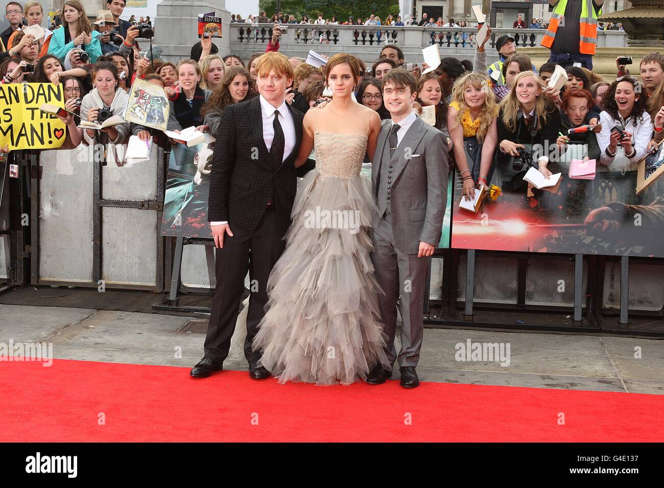 Rupert Grint, Emma Watson and Daniel Radcliffe at the world premiere of Harry Potter And The Deathly Hallows: Part 2. Stock Photo