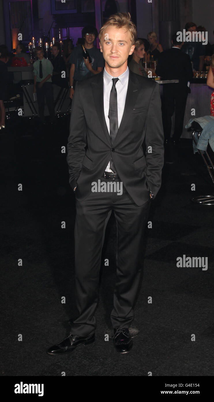 Tom Felton arrives at the after show party for 'Harry Potter and the Deathly Hallows Part Two', at the Old Billingsgate Market, London. Stock Photo