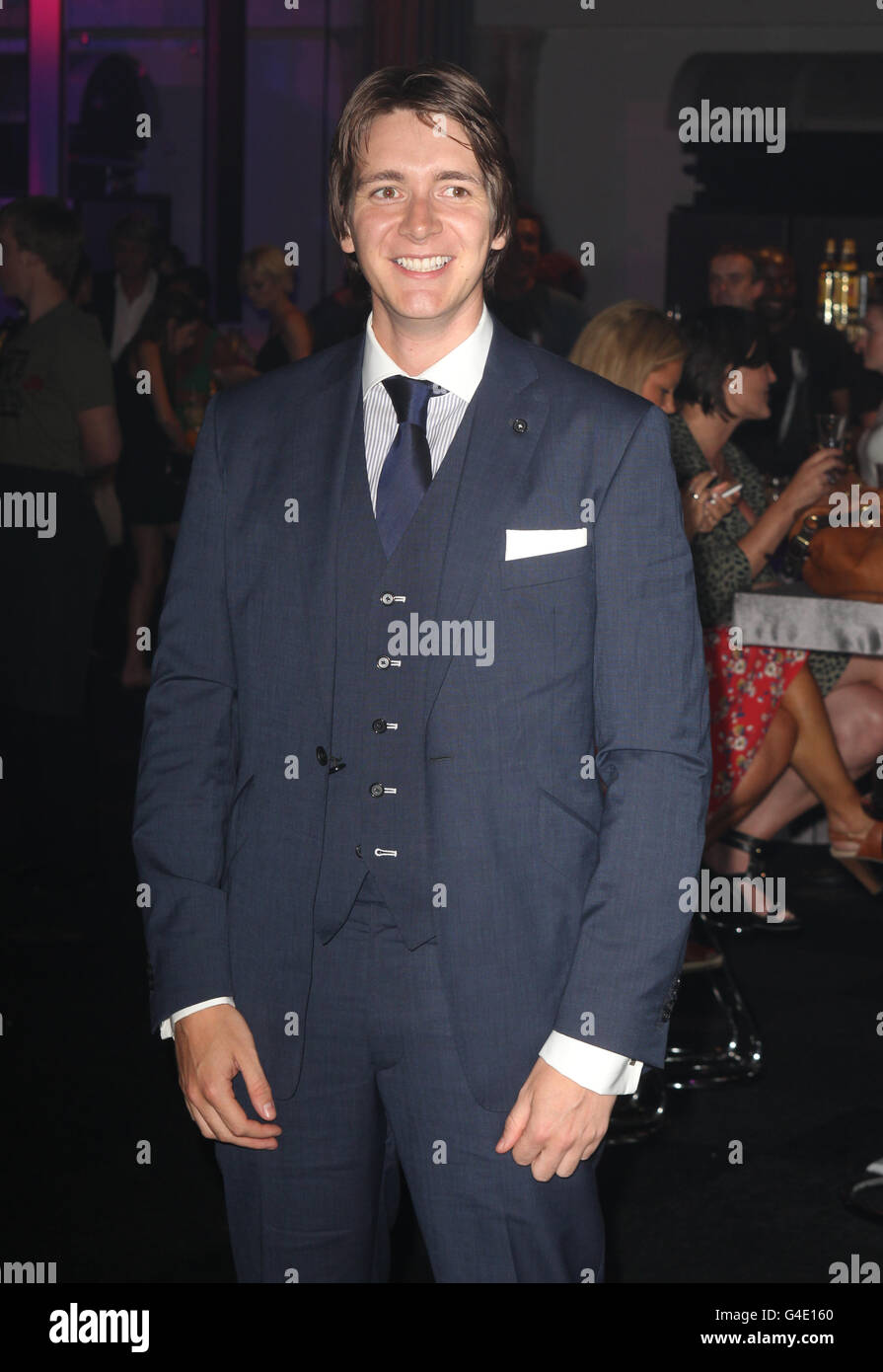 James Phelps arrives at the after show party for 'Harry Potter and the Deathly Hallows Part Two', at the Old Billingsgate Market, London. Stock Photo