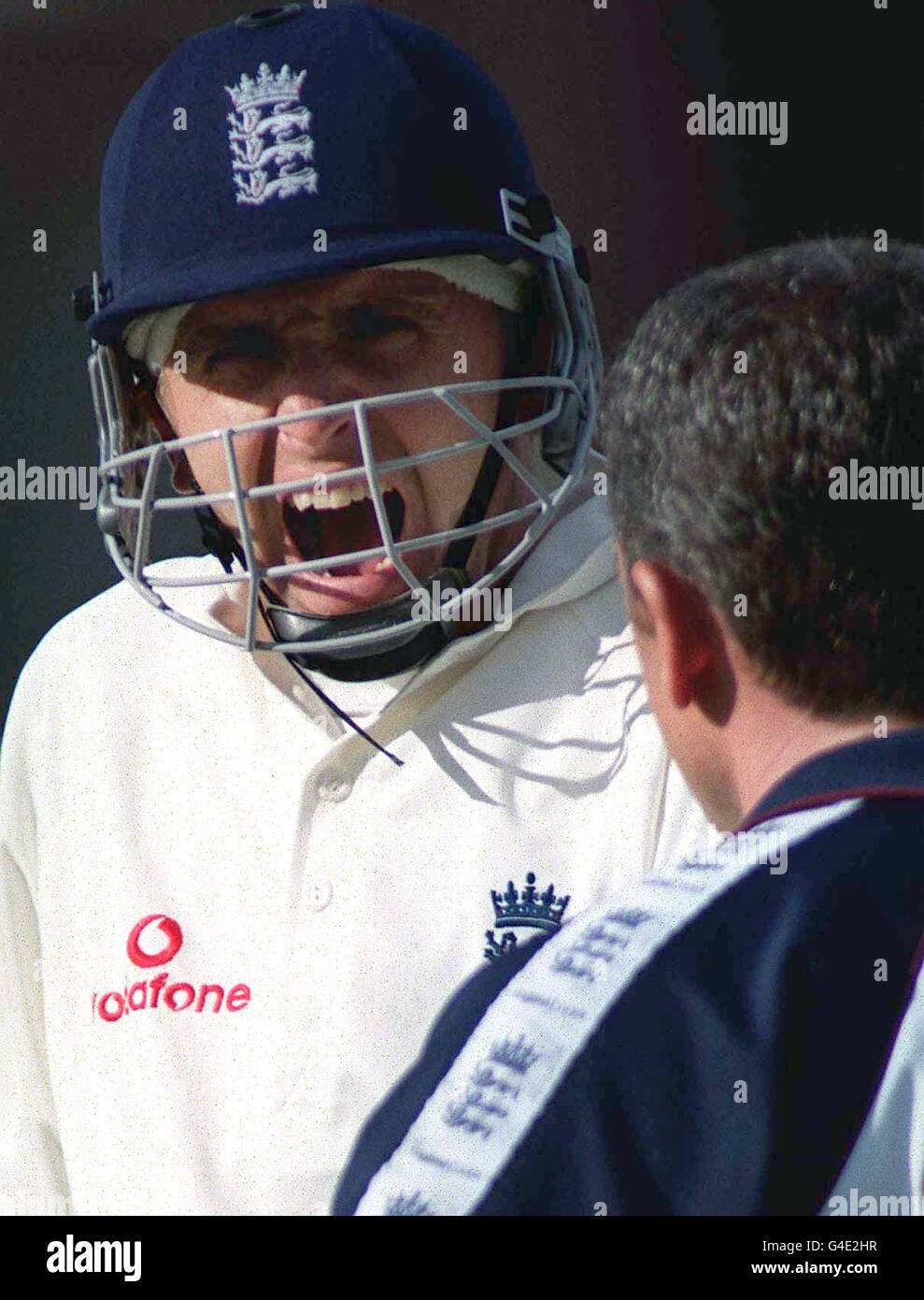 England's Dominic Cork suffering after being hit on the elbow by a delivery from South Africa's