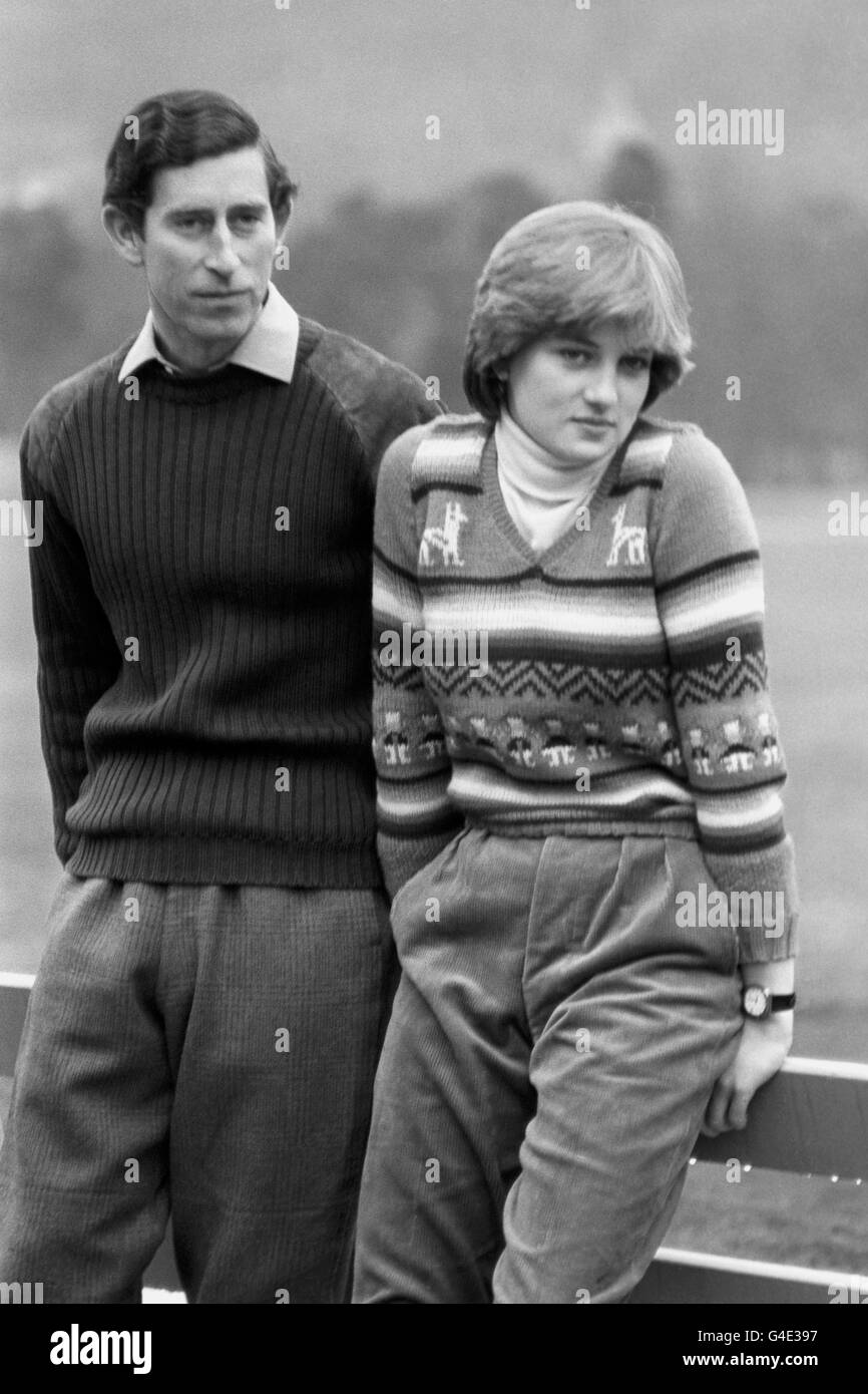 The casually clad Prince Charles of Wales and his fiance Lady Diana Spencer, relaxing on a fence at Balmoral on May 6, 1981, during their Scottish holiday. Stock Photo