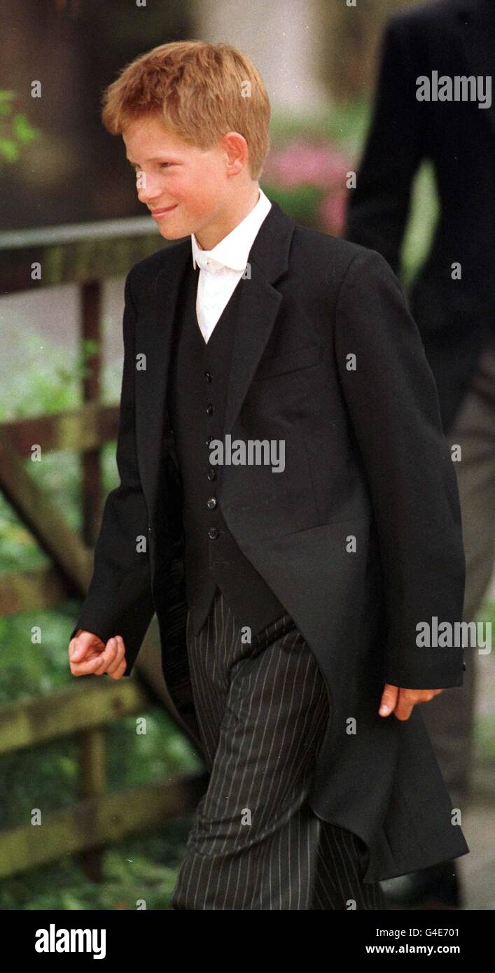 Prince Harry sets off for his first day at Eton College this morning. PHOTOGRAPH BY JOHN STILLWELL/PA. 12/06/03 : Prince Harry on his first full day at Eton College - from where he leaves later after sitting his final exam at the end of five years at the top public school. Like his older brother William, Harry spent his Eton schooldays boarding at Manor House, on the site of the lodgings of probably the most famous Old Etonian of them all, victor of Waterloo, the Duke of Wellington. Stock Photo