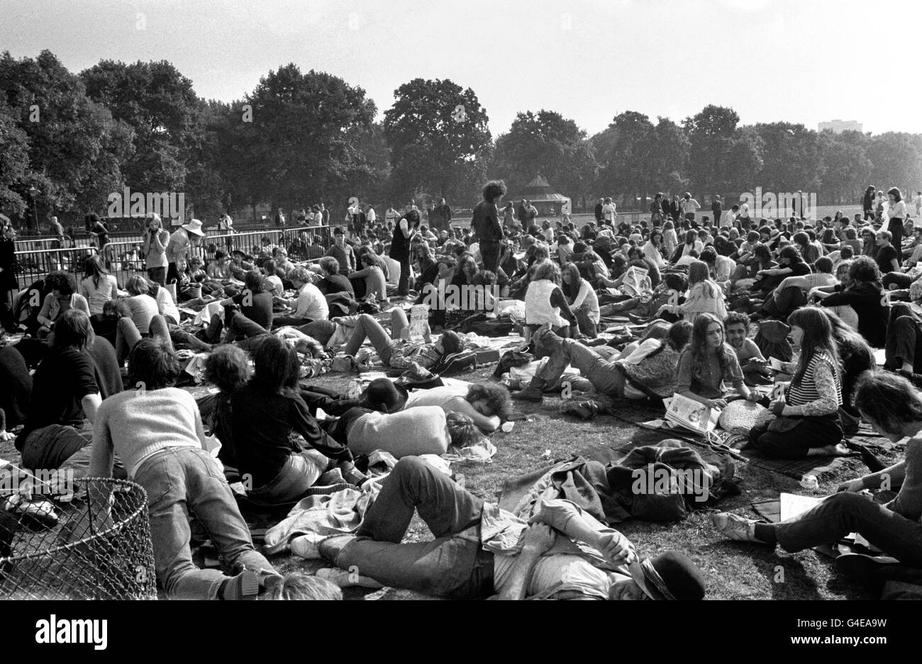 A GENERAL VIEW OF THE AREA NEAR SPEAKER'S CORNER, HYDE PARK, LONDON OF EARLY ARRIVALS ATTENDING A POP CONCERT THAT WAS THE LAST OF THE YEARS FREE OPEN-AIR CONCERTS IN THE PARK. Stock Photo